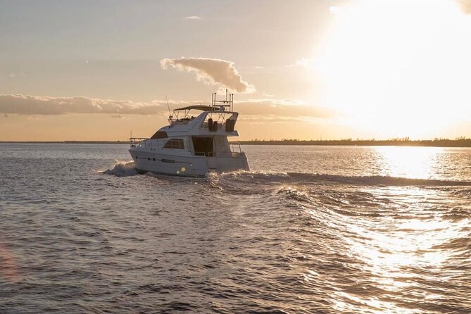 2 Hour Sunset- 60' Neptunus Tulum, Playa del Carmen, Riviera Maya - Enter Puerto Aventuras Marina: cocktails, sunset views, and underwater lights