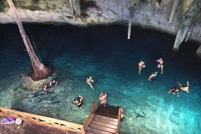 4 Cenotes Full Day Tour from Merida - Homun Cenotes: Light Through a Hole and a Standout Swim