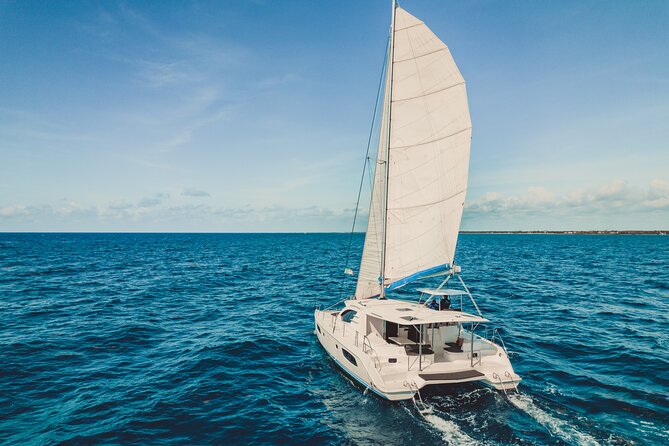 5H Private 44' Catamaran All-Inclusive - Tulum & Playa del Carmen - Stop 1 at In-Ha: calm snorkeling water and ceviche served in the flow