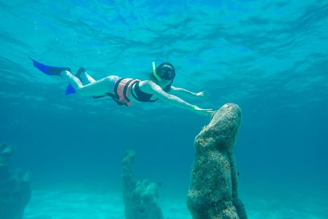 Afternoon Half-Day Catmaran Sailing and Snorkel Adventure - Isla Mujeres free time: 2 hours to see the island your way