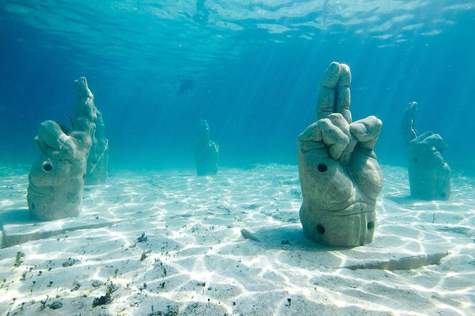 Afternoon Half-Day Catmaran Sailing and Snorkel Adventure - Snorkeling near Isla Mujeres: gear, safety rules, and realistic expectations