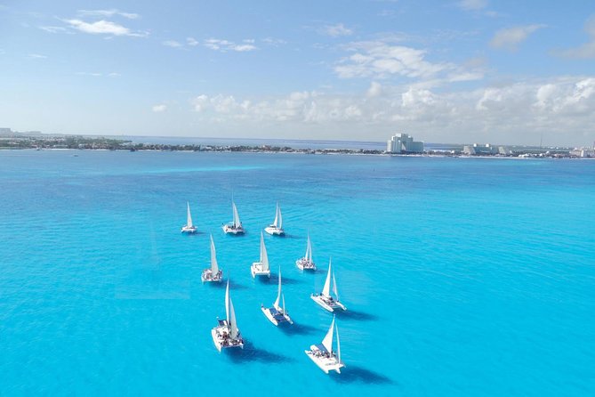 All Inclusive Caribbean adventure, reef snorkeling, Food & Drinks - Cancun to Isla Mujeres by Catamaran: the first real win