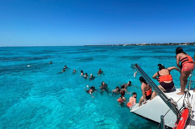 All Inclusive Isla Mujeres Catamaran - Beach Club time on Isla Mujeres: buffet lunch, open bar, and optional island add-ons