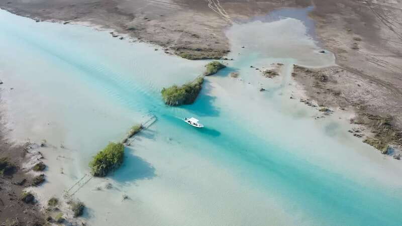 Bacalar: 3 Hour Boat Trip with Swimming & Drinks - Cenote Esmeralda and Cenote Cocalitos: what you see from the boat