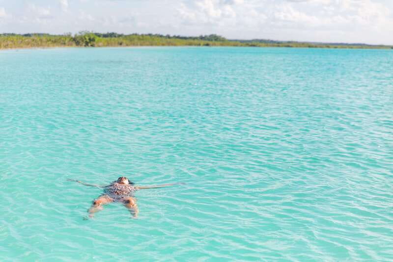 Bacalar: Group Sailing Trip with Swimming and Drinks - Pirate Canal and Cenote Negro: the swim-and-photo rhythm that keeps it fun