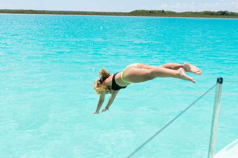 Bacalar: Group Sailing Trip with Swimming and Drinks - Getting aboard at Casa China Bacalar: what the first hour sets up