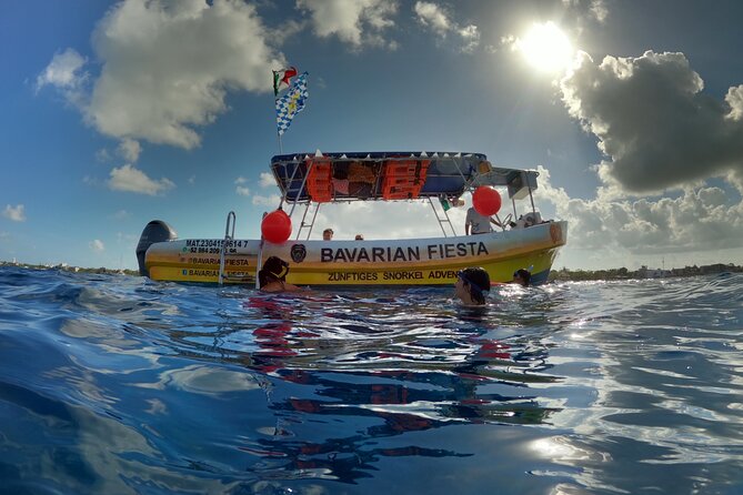 Bavarian Fiesta Snorkel Activity in Glass Bottom Boat at San Miguel de Cozumel - Snacks, soda, margaritas, and the Bavarian beer value play