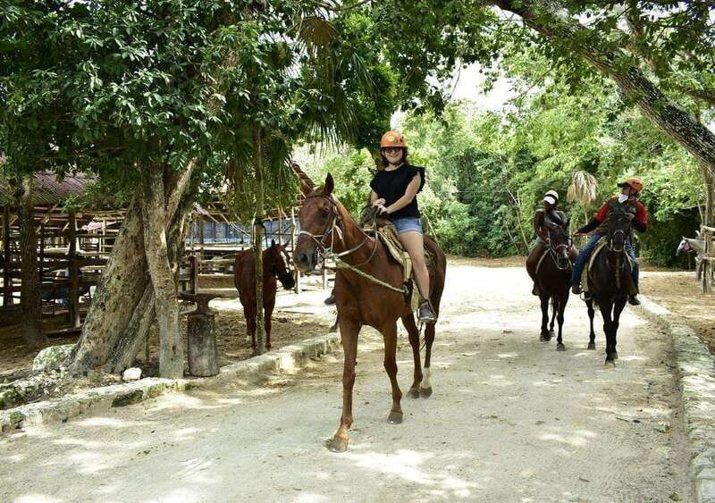 Cancun: Amazing Horseback Riding Tour, Cenote, Zipline & ATV - Zipline over the treetops, safety gear, and weight checks