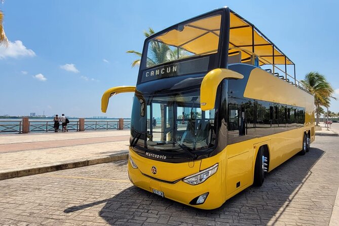 Cancun City Sightseeing and Shopping Tour on a Double Decker bus - Boulevard Kukulcan ride, hotel-zone views, and what to look for