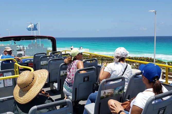 Cancun Guided Bus City Tour (from Cancun and Riviera Maya) - Playa Delfines and the Cancun Sign: Timing Your Photos for Heat