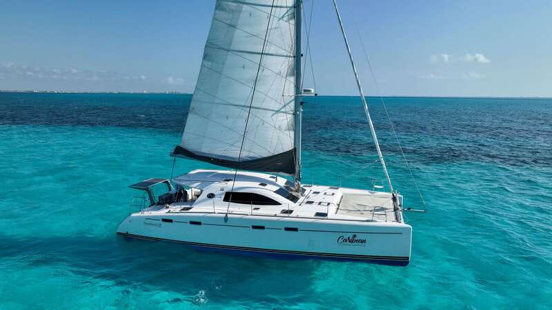 Cancun: Isla Mujeres Catamaran + Coco Bongo Show - Arrecife El Meco snorkeling: short time, do it right