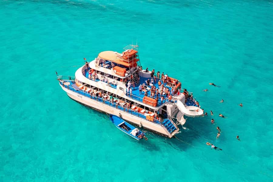 Cancun: Isla Mujeres Full Day Dancer Cruise - Your floating home: how the 3-story catamaran is set up