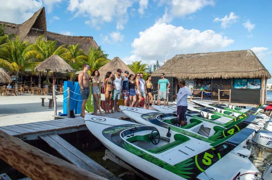 Cancún: Jungle Tour and Speed Boat Tour Adventure - Marina Chac Chi check-in, parking lot entrance, and getting ready