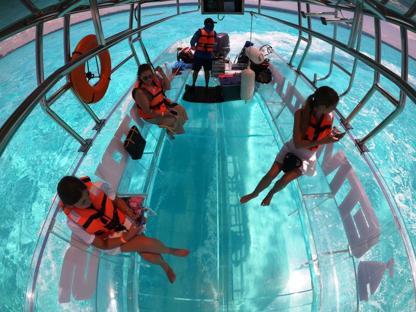 Cancún: Nichupté Lagoon Transparent Boat Tour with Drinks - How the 1.5-hour route works: scenic cruise, marine life viewing, photo stop