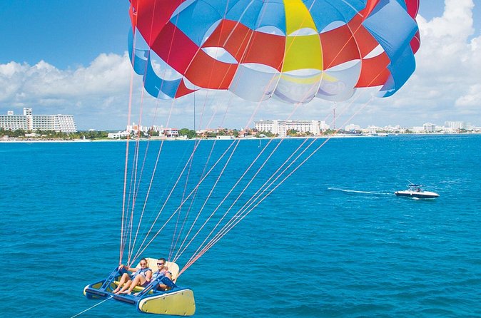 Cancun Parasailing Adventure - The view: Cancun hotel zone, Isla Mujeres, and jungle lines