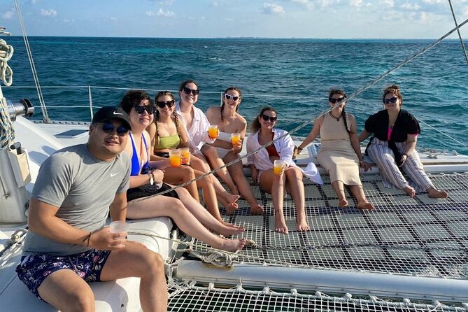 Cancun's Best: Catamaran to Isla Mujeres, Snorkeling & Drinks! - Boat day comfort: open bar, live music, and a small reality check