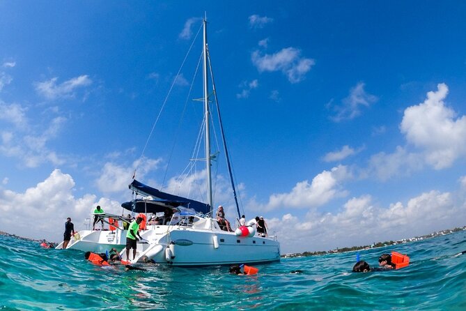 Cancun Sailing Catamaran Islas Mujeres With Luxury Beach Club - Boarding at the Caribbean Golden Catamarans dock: what to expect