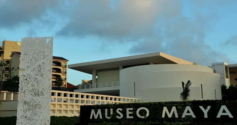 Cancun: Skip-the-Line Mayan Museum & San Miguelito Site - Inside the Cancun Mayan Museum, tall halls and lagoon-framed views