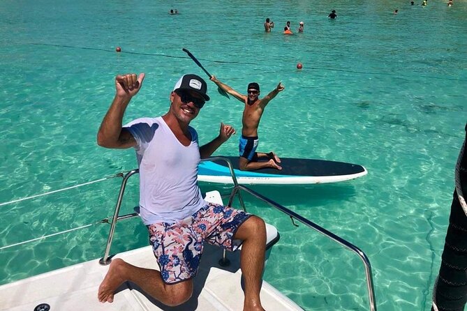 Cancun to Isla Mujeres Private Catamaran Cruising Snorkeling Fun! - Sailing to Isla Mujeres: open bar, cold drinks, and real downtime