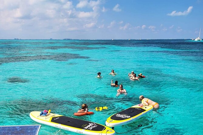 Cancun to Isla Mujeres Private Catamaran Cruising Snorkeling Fun! - The second Playa Norte anchor: swimming time and island coast sightseeing