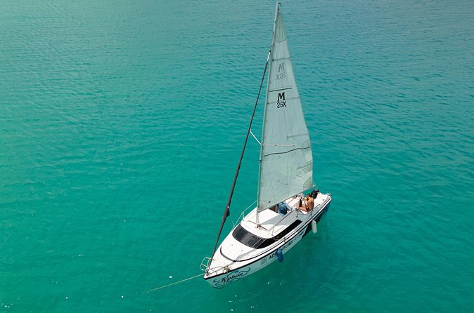 Catamaran Adventure: Navigate the Seven Colors - Crew Energy: Captain and Bilingual Guide Make the Difference