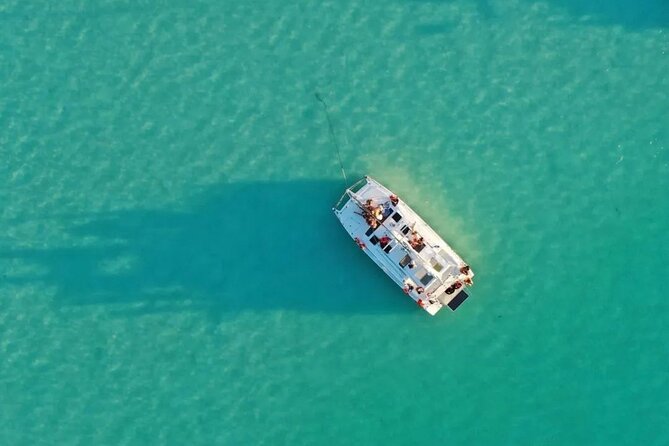 Catamaran Adventure: Sailing and Swimming in the Bacalar Lagoon - What Happens on Board: Drinks, Music, and Photo Time