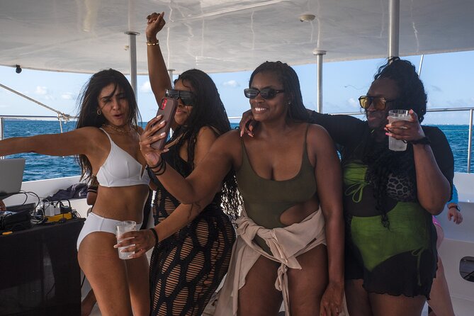 Catamaran Booze Party With Open Bar in Cancun - Playa Norte Time: DJ Energy, Music, and a Swim Window