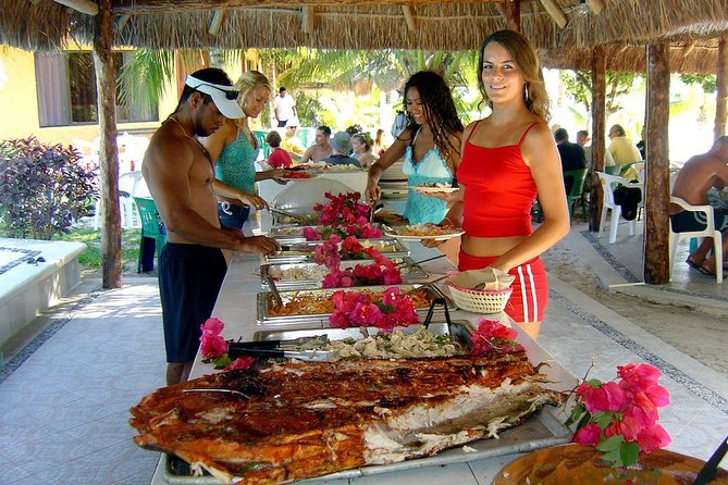 Catamaran Sailing to Isla Mujeres with Snorkeling, Lunch & Open Bar included - Beach club time at Isla Mujeres: access is included, comfort may not be