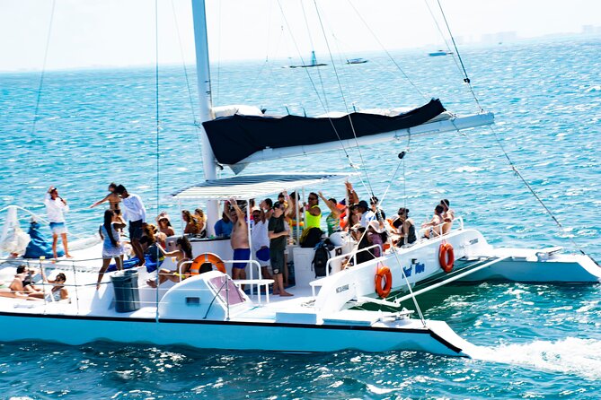Catamaran to Isla Mujeres, Open bar, buffet, Beach Club Included - What kind of day is this, really?