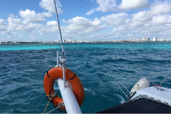 Catamaran to Isla Mujeres, Open bar, buffet, Beach Club Included - Leaving Cancun: onboard music, games, and a possible spinnaker