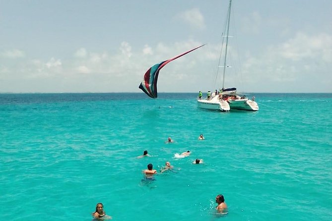 Catamaran to Isla Mujeres, Open bar, buffet, Beach Club Included - The Isla Mujeres plan: beach club time plus shopping help