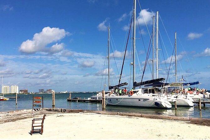 Catamaran to Isla Mujeres, Open bar, buffet, Beach Club Included - Ultramar and Punta Norte: the walk, the beach, and the shops