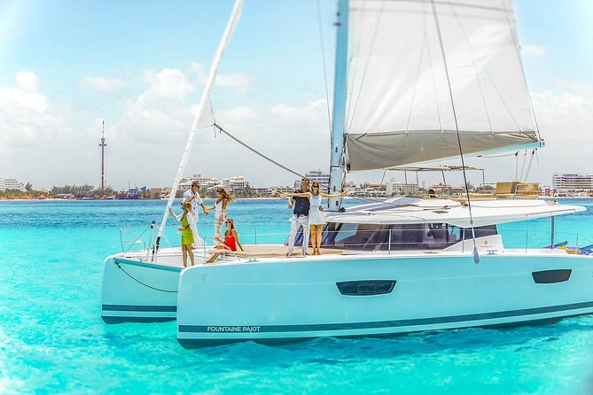 Catamaran to Isla Mujeres Snorkeling Tour with Open Bar and Lunch - Isla Mujeres town walk: souvenirs, side streets, and sales pressure