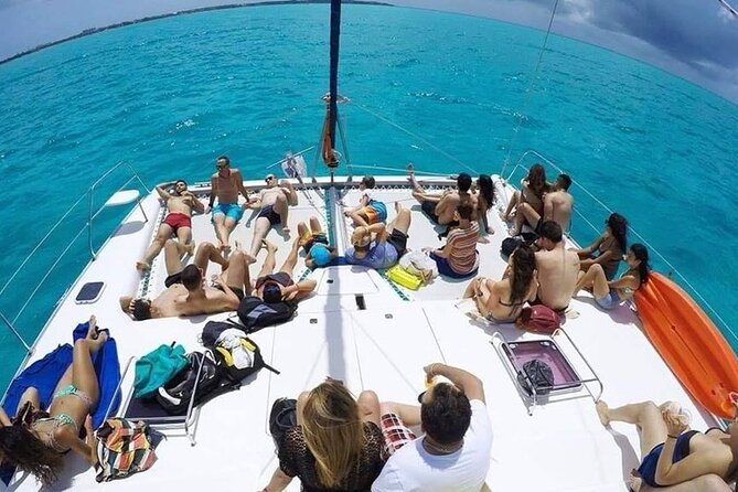 Catamaran Tour to Isla Mujeres from Cancún with Bar and Lunch - The Catamaran Ride: Music, Waves, and an Open Bar That Changes the Mood