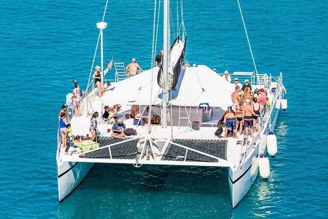 Catamaran Tour to Isla Mujeres from Cancún with Bar and Lunch - Isla Mujeres Town Time: Souvenirs and Just Enough Freedom