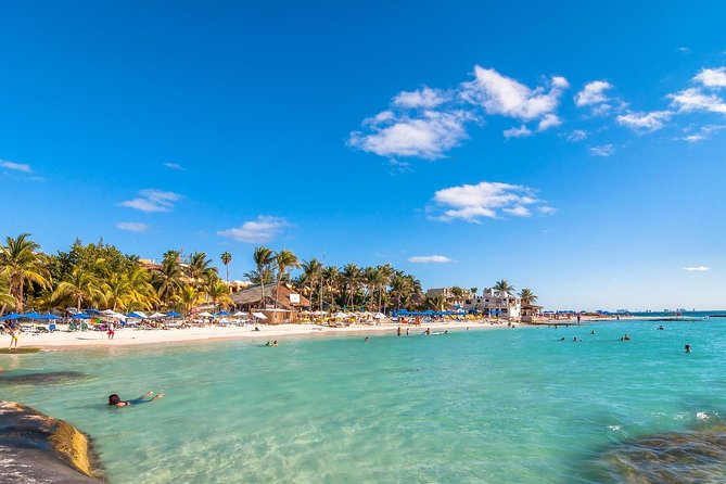 Catamaran Tour to Isla Mujeres, Open bar, Lunch, Snorkeling, Beach Club Included - Beach club lunch and views: good break, mixed lunch opinions
