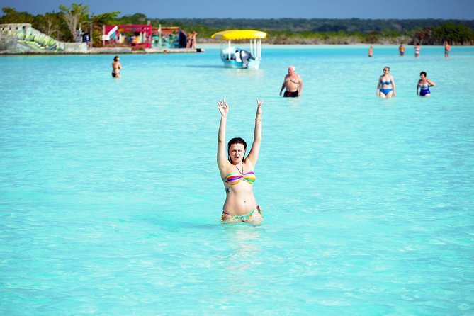 Chacchoben & Bacalar Combo Excursion Costa Maya - On the water in Bacalar: swimming time, boats, and those fresh fruit breaks
