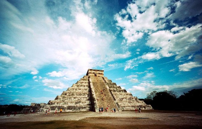 Chichen Itza Day Trip Exclusive Nool-Ha Cenote & Valladolid Visit - Getting there from Cancun: pickup time, bus time, and what to expect