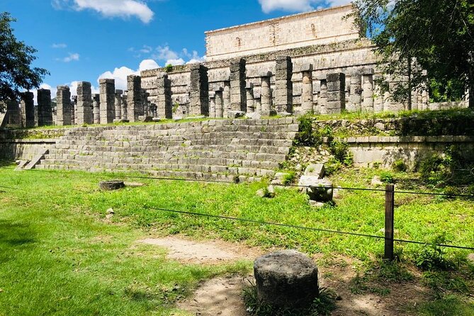 Chichén Itzá Premium Cenote y valladolid Day Tour - Cenote Chichikán: stairs, vests, and Xibalbá vibes