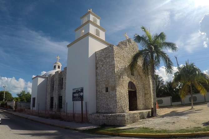 Cozumel History Walking Tour - Downtown plaza landmarks: Mexican flag monument, clock tower, and first City Hall