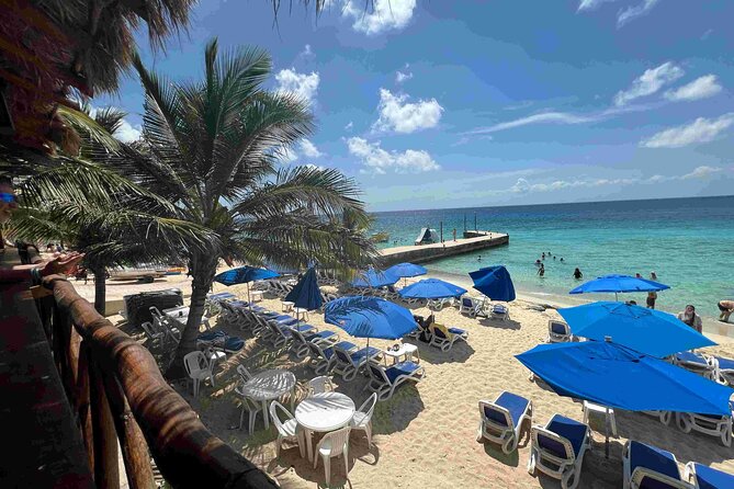 Cozumel Island Tour: Mayan Ruins, Reefs, and Beach Escape - Tequila Beach Club Cozumel: shaded chairs, private area, and a welcome drink