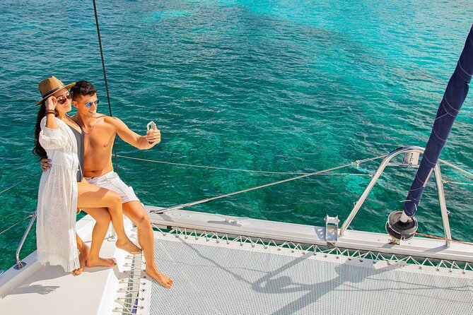 Cozumel Luxury Sailing & Snorkeling with Lunch and Open Bar Onboard - Lunch, cocktails, and onboard staff: the vibe is friendly, the drinks are a lot