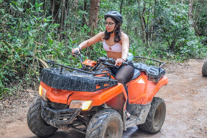 Drive an Atv shared, swim in a Cenote and ziplines in the Cancun - Guides, lockers, photos, and the extras that change the bill