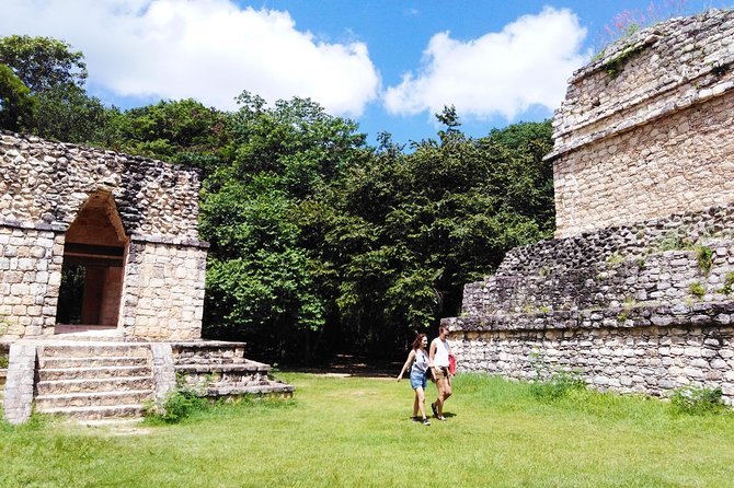 Ek Balam Ruins and Cenote Maya Park Day Trip from Playa del Carmen - Cenote Maya Park at midday: 60 m circular cenote plus real adventure options