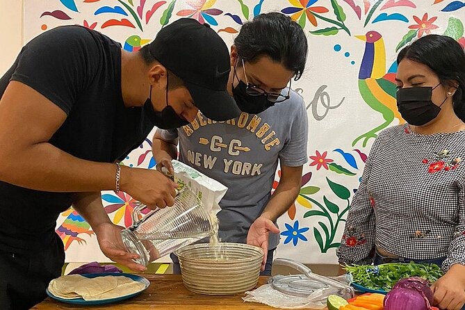 Elaboration of tortillas by hand following the Mexican tradition - What You Actually Eat: Beans, Cheese, Onion, and Sauce Choices