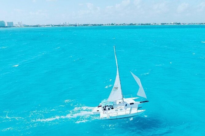 Exciting Catamaran Tour to Isla Mujeres, from Cancún! - Beach Club Lunch and the Real Restroom, Table, and Food Notes