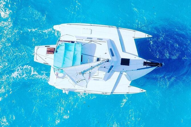 Exciting Catamaran Tour to Isla Mujeres, from Cancún! - Weather and Extras: Spinnaker Flying and What It Means for Your Day