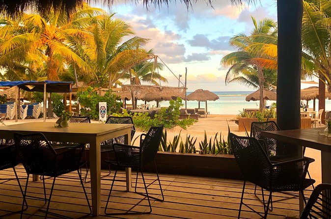 Exclusive Open Bar Experience at Yaya Beach - Dining options: restaurant area or right on the beach