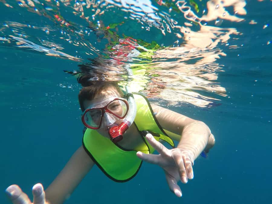 From Cozumel: El Cielo Beach by Catamaran Snorkeling Tour - The on-board food and drinks, plus why the timing matters