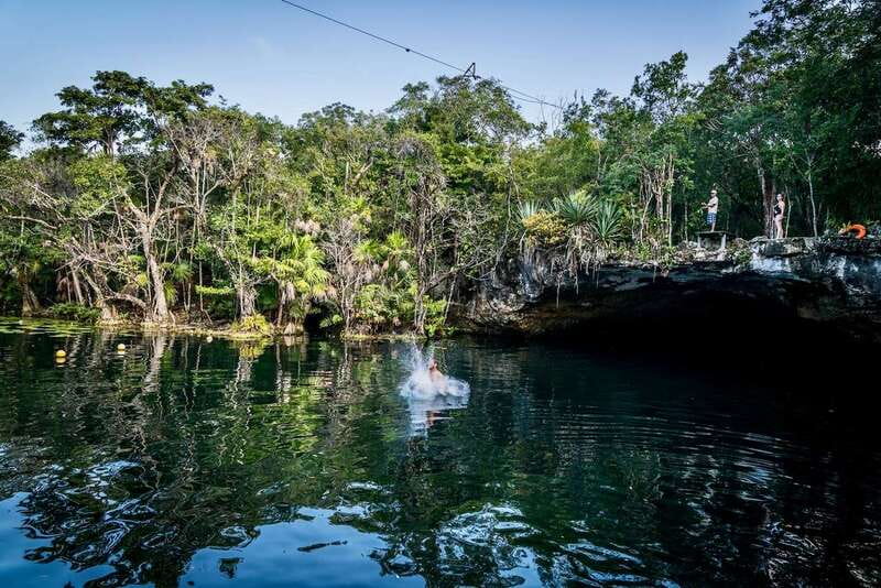 From Tulum: Four-Cenote Adventure - Naval Cenote: zip line, jump, and a refreshing first swim